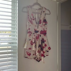 Legs n chest night out romper with the illusion of a skirt